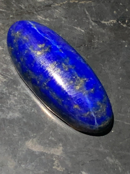 Lapis lazuli, cabochon de 29 mm x 12 x 7 - 20,5 carats. Parfait en bijouterie, collection ,exposition...