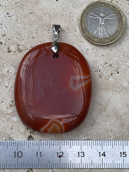 Cornaline, pendentif de 55mm de hauteur x 38 de largeur x 9 d'épaisseur. Vendu avec cordon réglable de couleur noire !