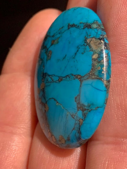 Turquoise reconstituée, cabochon de forme ovale de 40 mm x 30 x 5 - 9,4 gr.