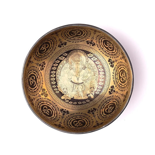 Bol en 7 métaux avec gravure de 'Ganesh', taille de 22/24 cm - ± 1400/1600 gr. Vendu avec maillet adapté. Fait main au Népal !