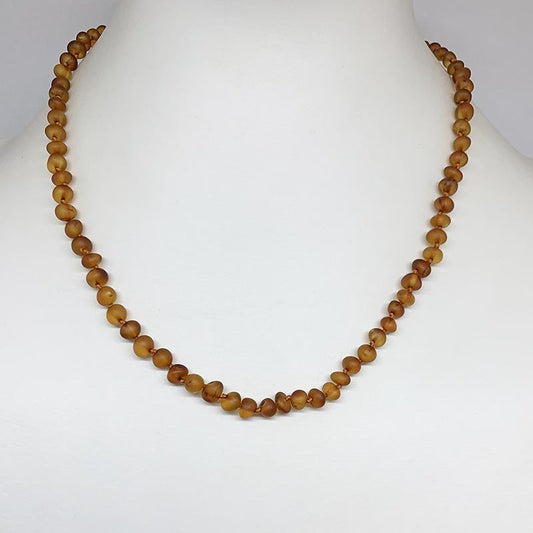 Ambre 'Cognac' finition dépoli, perles de 6 à 7 mm, vendu en collier de 50 cm - Fermoir à 'Vis. Qualité AA à AAA !