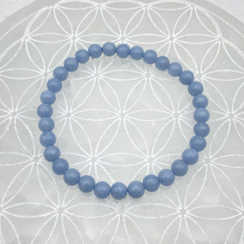Angélite – Perles rondes 6 ou 8 mm • Fil de 38/39 cm • Bracelet 17 à 21 cm • Collier 45 cm • Sautoir 60 cm. Qualité AA à AAA – Superbes perles d’une grande pureté, parfaites en bijouterie !