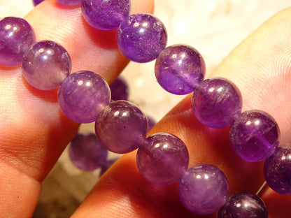 Améthyste, perles rondes 6, 8 ou 10 mm • Fil de 38/39 cm • Bracelet 17 à 21 cm • Collier 45 cm • Sautoir 60 cm. Qualité AA à AAA – Superbe qualité !