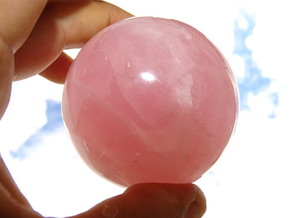 Rose Quartz Sphere, 50 and 90 millimeters, 205 to 1000 grams. A soft and luminous stone! Perfect for lithotherapy, collection, exhibition...! 