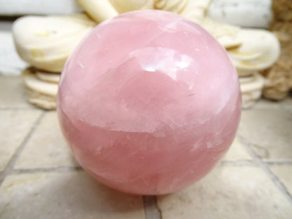 Rose Quartz Sphere, 50 and 90 millimeters, 205 to 1000 grams. A soft and luminous stone! Perfect for lithotherapy, collection, exhibition...! 