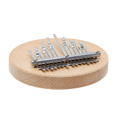 Kalimba 14 notes de chez 'Hands on Drum', avec ou sans aimant intégré (pour fixation sur un cajon ou un tambour). •Ø 14 centimètres - 14 × 14 × 5 cm