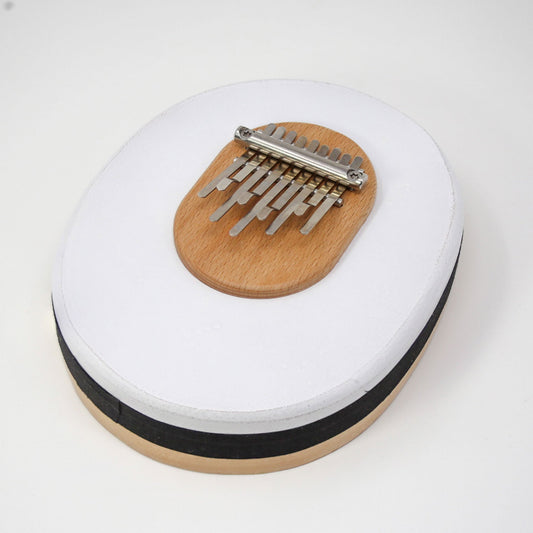 Kalimba/ Piano à doigt à 9 notes, 4 accordages au choix/ 2 finitions. Cadre en peau de veau, fait du meilleur acier qui confère un volume sonore professionnel !
