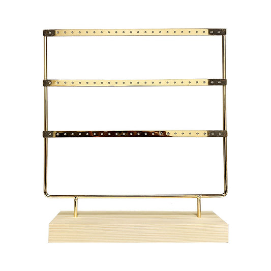 Support pour boucles d'oreilles en bois de pin et en cuivre, une pièce à la fois esthétique et pratique