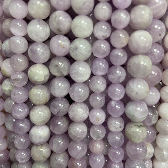 Kunzite/ Spodumène, perles rondes de 6 et 8 mm, vendu en : fil de perle 38/39 cm, en bracelet de 17 à 21cm, en collier de 45 ou sautoir de 60cm. Qualité AA à AAA, superbes perles cristaline et ultra puissante !