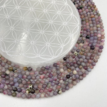 Tourmaline rose/ Rubellite, perles rondes de 6 ou 8 mm, vendu en : fil de perle 38/39 cm, en bracelet de 17 à 21cm, en collier de 45 ou sautoir de 60cm. Qualité AA à AAA !