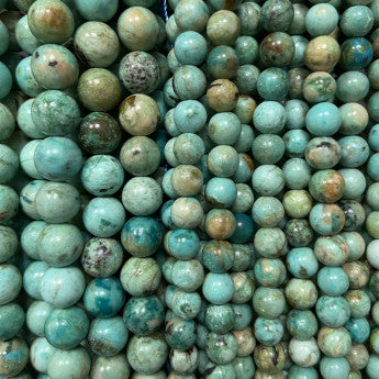 Turquoise de qualité Extra du Pérou, perles rondes de 6 et 8 mm, vendu en fil de perle 38/39 cm, en bracelet de 17 à 21 cm, en collier de 45 ou sautoir de 60 cm. Qualité AA à AAA, parfait !